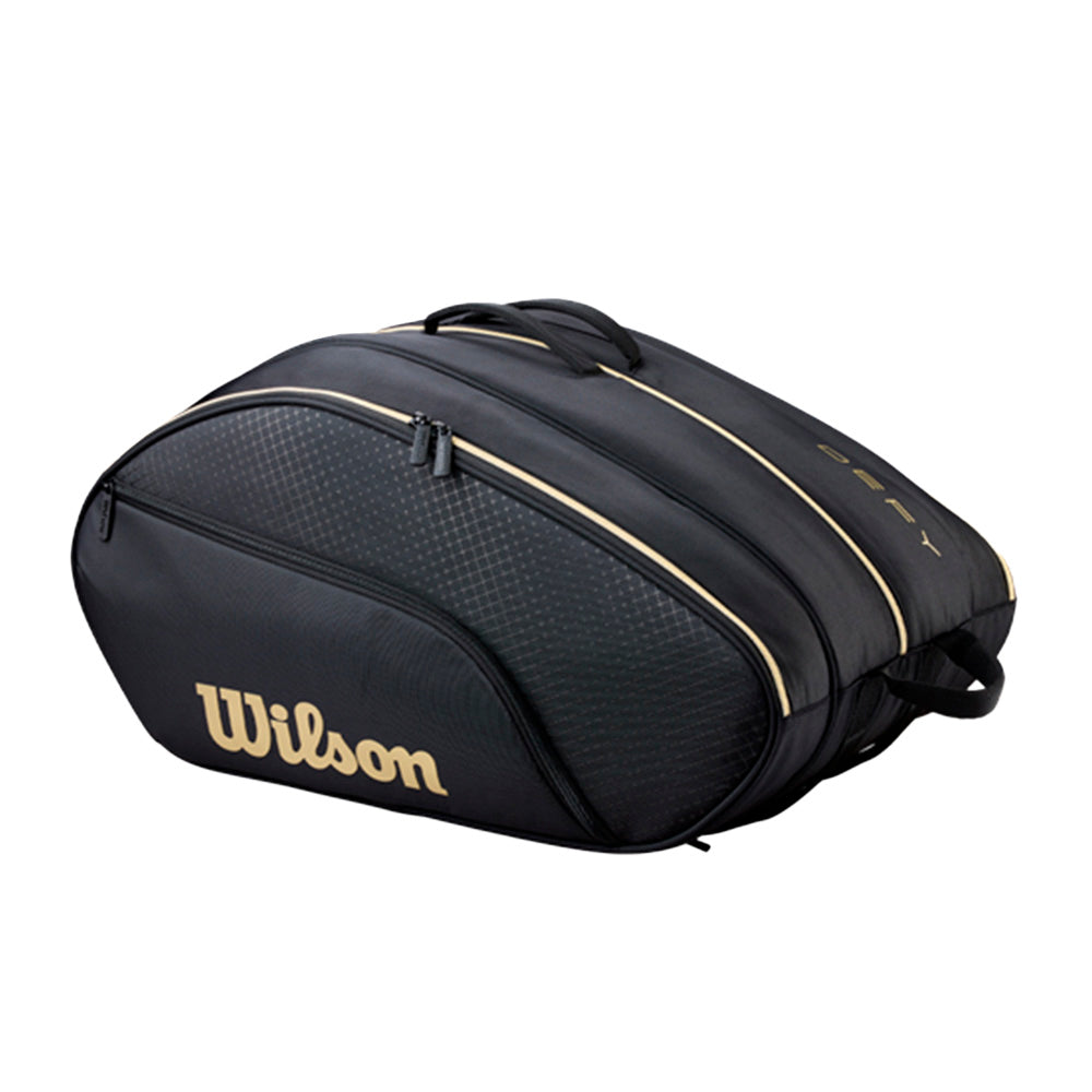 Wilson Defy V1 2026 zwart-goudkleurige padeltas met afgeronde vorm